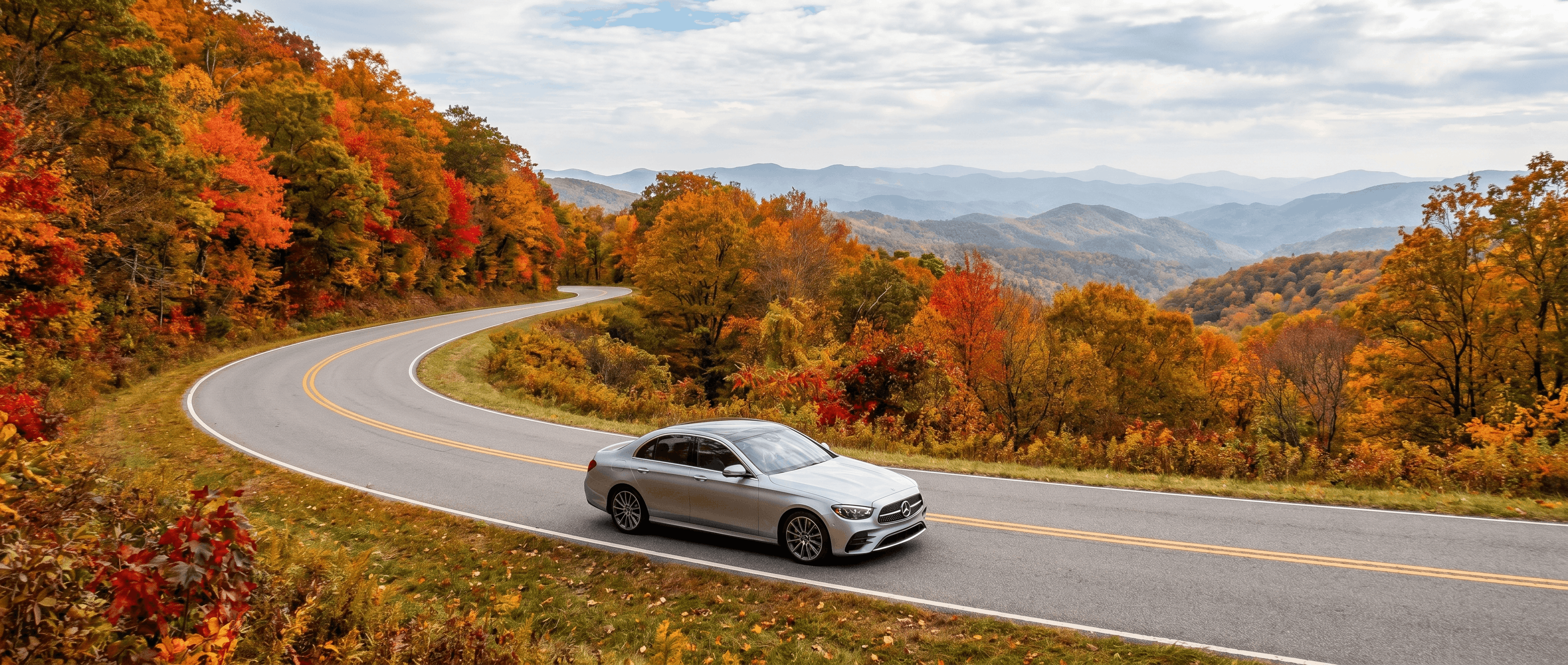 Mercedes-Benz driving scenic mountain roads North Georgia from Duluth, GA